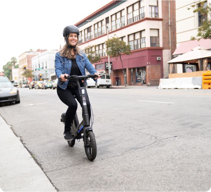 Woman rides e-bike
